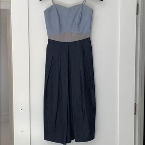 Strapless denim jumpsuit. MIDI length